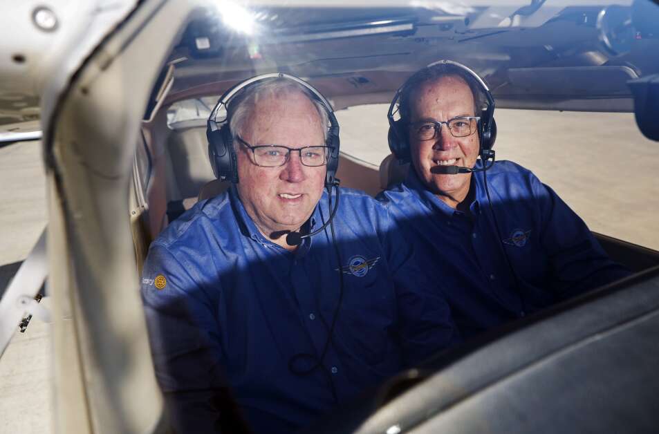 Peter Teahen (R) and John Ockenfels (L) through the windscreen Photo Courtesy Cedar Rapids Gazette(1).jpg